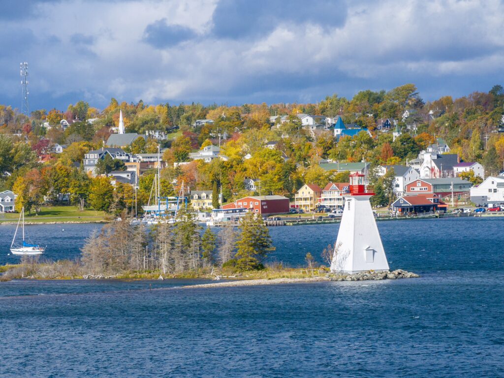 A fall aerial photo of the deck with Kidston Island lighthouse