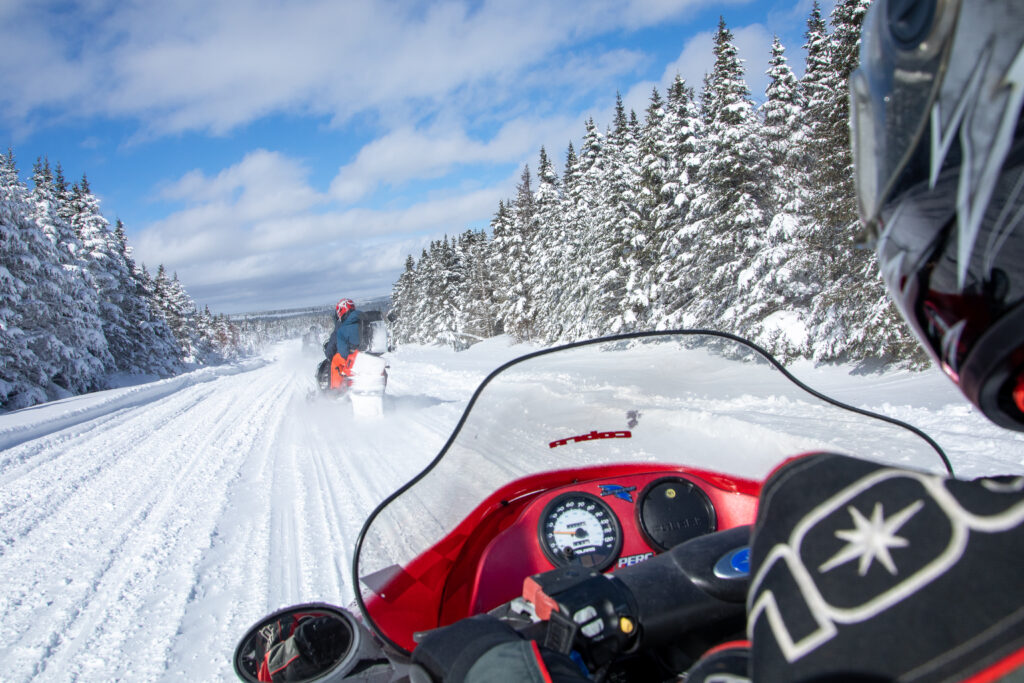 A snowmobile on a trail
